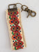 <p>Keep your keys close and your style even closer with our adorable Embroidered Key Fobs! Designed with convenience in mind, these key chains are perfect for carrying on your wrist while running errands. The clip and key ring make it easy to keep track of your essentials, while the embroidered designs add a playful and festive touch.</p> <p>Details:</p> <ul> <li>Embroidered loop fits comfortably around your wrist. Features antiqued brass key ring and lobster clasp to easily clip to your bag or belt loop