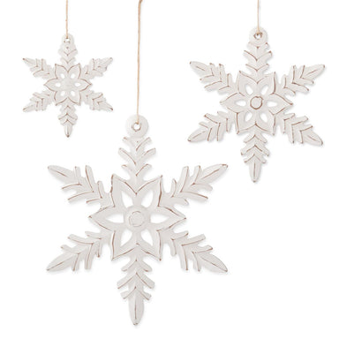 Bring timeless elegance to your holiday décor with this natural-looking white wood snowflake ornament. Featuring an ornate, intricately carved design, it captures the delicate beauty of winter's most iconic symbol. Perfect for hanging on your Christmas tree to add sophisticated charm, or display it on your wall as a stunning seasonal accent. The white finish complements any décor style, making it an ideal gift for those who appreciate refined, classic holiday aesthetics.

Dimensions:

Small:&nbsp;6"H x 5.75