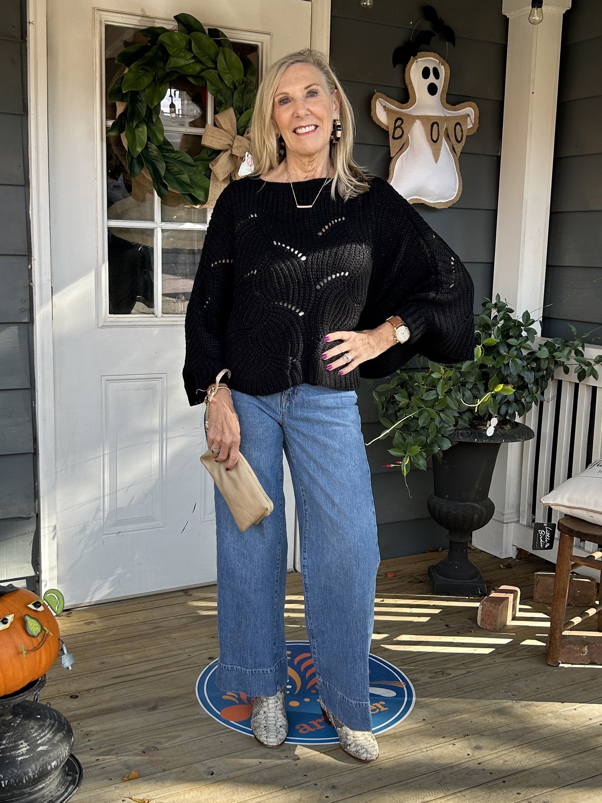 How cute it this crocheted cropped sweater?!  With a bow neck, dolman sleeves and an open weave, and a scalloped hem, it is so simple but adorable! We are calling it cropped, but it hits at your hips. Layer it with your favorite tank, or it cooler weather with a turtleneck.   Available in 5 colors.   Material: 100% Acrylic  One size fits most.   Care Instructions: Hand wash cold, dry flat