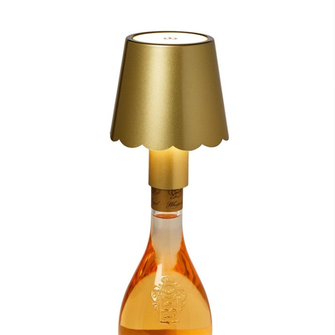 Transform any bottle into ambient lighting with this elegant LED lampshade. The touchable gold scalloped design features a rechargeable battery, stepless dimming, and multiple LED color options for customized ambiance. Includes a matching bottle stopper for easy installation. Ideal for home décor, entertaining, or creating a personalized gift that combines style with smart functionality.

LED Touchable Gold Scalloped Lampshade with Bottle Stopper in Gift Box (fits most bottles/jars, 2200mAh rechargeable bat