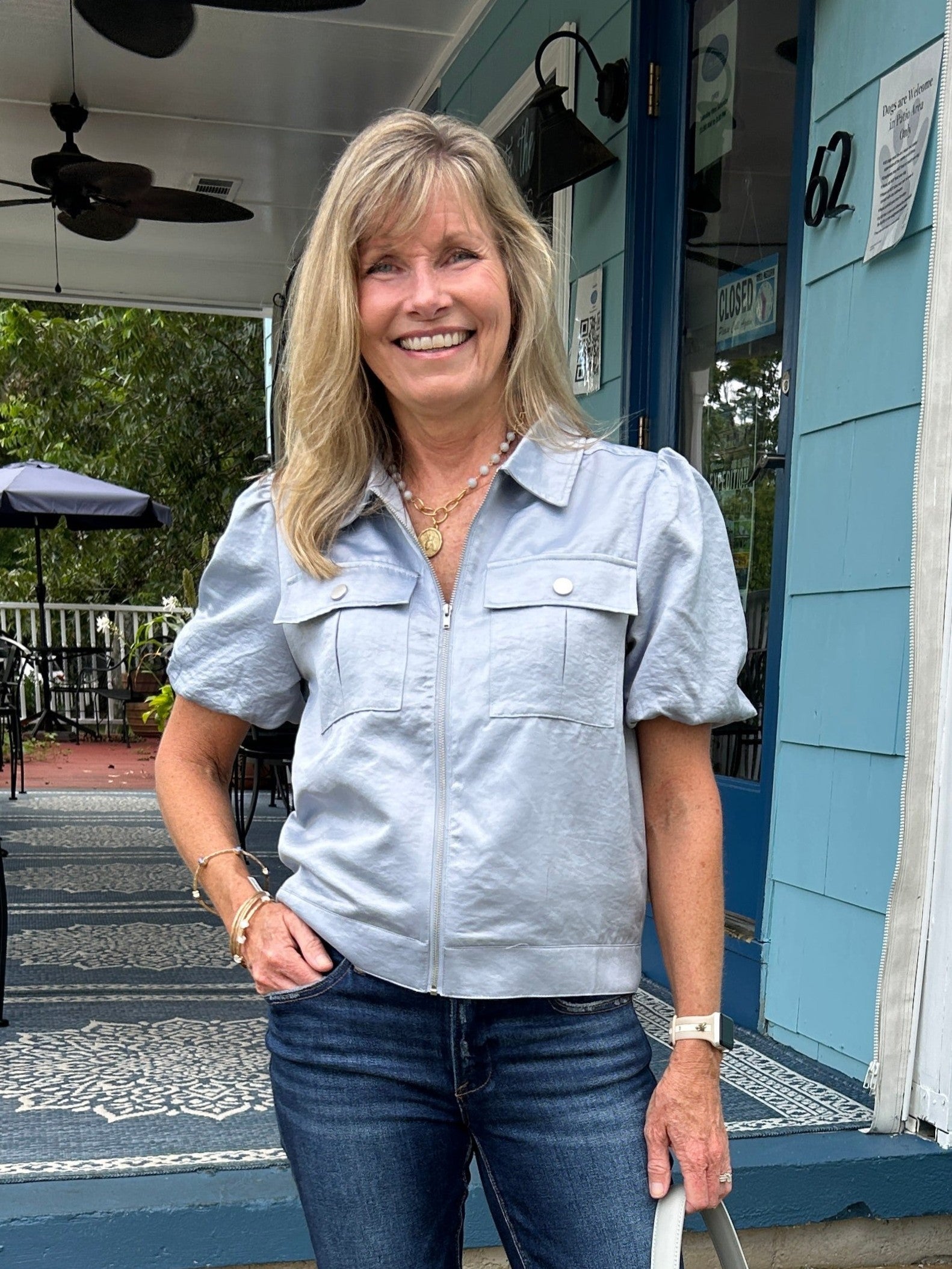 How beautiful is the jacket / top?! We love the gorgeous blue color, the soft material with it's slight sheen, the fabulous colar and slightly puffed sleeves! It zips to be your top, or you can layer it and wear it as a jacket. It will become one of your season favorites, for sure!

Taupe willl be coming later in the season.&nbsp;

Carolee is wearing a Small. She paired it with our Risen flare jeans and some awesome jewelry!&nbsp;

Material: 90% Polyester / 10% Nylon

Care Instructions: Dry clean.&nbsp;