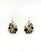 Make a refined statement with these exquisite gold dangle earrings, showcasing an alluring blend of black multi-toned stones that create depth and visual intrigue. The flowing design moves gracefully with you, adding an air of sophistication to any ensemble. Whether you're dressing up for an evening event or elevating your professional wardrobe, these versatile pieces deliver timeless elegance.&nbsp;