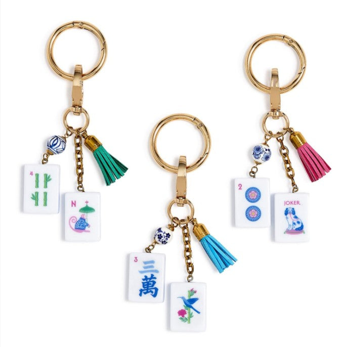 Add a playful finishing touch to bags, totes, or keys with these charming mahjong-inspired accessories. Crafted from a mix of alloy and acrylic, each piece features vibrant designs that bring personality and color to everyday items. Choose from three assorted designs to match your style. Perfect for mahjong enthusiasts, game lovers, or anyone who appreciates unique, conversation-starting accessories. Makes an ideal gift or fun impulse purchase.

Details:

Features playful mahjong-inspired charm designs
Craf