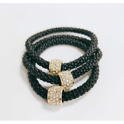 This chic bracelet adds a touch of elegance to any look. Crafted from durable snake chain, it's simple and stretchy for the perfect fit. Choose from several colors to make it your own.