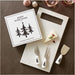 Bring the holiday cheer home with the Merry Everything Knife Set! Featuring three unique knives perfect for cutting all kinds of cheese, this set is a must-have for any winter gathering. Give the gift of ultimate cheese slicing and make every party a celebration with this perfect hostess gift.  Material: Ceramic, Stainless Steel  Size: Cardboard Box: 7" W x 7.125" H x 1.25" D  Care Instructions: Hand Wash Only