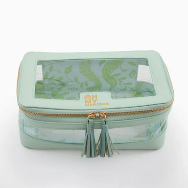 Keep your mahjong tiles organized in style with this thoughtfully designed storage bag. The structured silhouette maintains its shape for easy stacking and storage, while a zip-around closure keeps tiles secure. A clear panel lets you view your collection at a glance, and the built-in label window helps you identify sets instantly—perfect for collectors with multiple bags. Inside, a patterned lining adds personality, while coordinating tassel zipper pulls and a back handle make transport effortless. Fresh, 