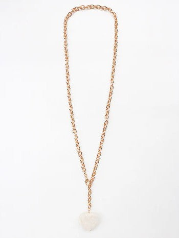 Discover the perfect blend of romance and versatility with this striking gold chain necklace, crowned by a breathtaking white stone heart pendant. The elongated chain design offers endless styling possibilities—wear it long for understated sophistication or layer it with complementary pieces for added dimension. Ideal for Valentine's declarations of love, spring celebrations, or as a cherished everyday accessory, this necklace transcends seasonal trends. The lustrous gold finish pairs beautifully with the l