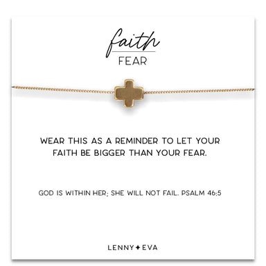 This Faith Over Fear Necklace is the perfect inspirational reminder to never give up. With its stylish cross pendant design, delicate chain and smooth finish, you can have faith that this necklace will accompany you throughout your journey. Choose courage over fear and enjoy the simple beauty of this necklace!  slide adjusts up to 20 inches 12K gold plate over brass chain matte gold cross, 8.5 mm includes story card and gift box