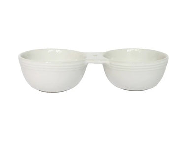 Double your serving options with the Pinstripes Double Dipper by Nora Fleming. These ingeniously connected bowls let you present contrasting flavors side by side—sweet alongside savory, or two distinct dips for maximum variety. Whether you're hosting a dinner party or enjoying a casual snack spread, this stylish piece keeps complementary treats perfectly paired and beautifully displayed. The sophisticated pinstripe design adds elegance to any occasion, while the practical dual-bowl design ensures your guest