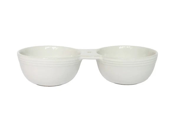 Double your serving options with the Pinstripes Double Dipper by Nora Fleming. These ingeniously connected bowls let you present contrasting flavors side by side—sweet alongside savory, or two distinct dips for maximum variety. Whether you're hosting a dinner party or enjoying a casual snack spread, this stylish piece keeps complementary treats perfectly paired and beautifully displayed. The sophisticated pinstripe design adds elegance to any occasion, while the practical dual-bowl design ensures your guest