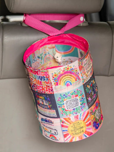 Make your car or dorm room clutter-free with our Pop-Up Car Trash Can! Easy to use and store, it securely attaches to your car's headrest with a built-in loop. Say goodbye to messy spaces with this convenient and efficient solution! Keep your space clean and organized with ease!  Nylon straps have snaps for easy attaching and storage. Great for cars, camping and small spaces  Material: 100% polyester, exclusive of trim  Care Instructions: Wipe Clean With Damp Cloth