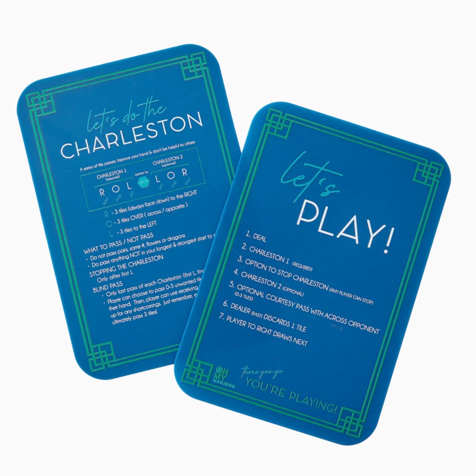 Transform your mahjong game with the must-have addition of Mahjong Shufflers! Effortlessly shuffle tiles with sleek style and seamless functionality. Endless entertainment for any occasion.

Includes:

2 shufflers
Rules
Tips printed on all 4 sides

Dimensions: 5.25” x 7.75”&nbsp;&nbsp;