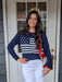 Celebrate summer and our great country with our Crew Neck Sweater featuring an American flag! Perfect for cool summer nights and transitioning from spring to fall, this lightweight and soft top is a must-have for Memorial Day and 4th of July festivities, or for a cool evening on a cruise or the beach. Add some fun to your wardrobe with this navy sweater with white and red accents.  Material: 54% Polyesters / 20% Acrylic / 20% Nylon / 6% Wool  Care Instructions: Hand wash cold water, lay flat to dry