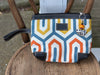 Make a difference with our Wristlet/Cosmetic Bag - Crafted with Purpose. This versatile bag offers a wristlet handle, a durable upholstery material, and an open inside pocket for added convenience. Don't forget the adorable keychain charm, adding a touch of cuteness to your daily essentials.

This bag is made by talented artisans in Kenya using upcycled upholstery fabric. Every purchase provides opportunities, empowers communities and creates sustainable livelihoods.

Carry more than a bag - carry hope.