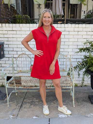 This Cap Sleeve Zip Front Dress is your go-to for game day and the perfect transition into fall. Crafted from soft, comfortable material with flattering cap sleeves, it features an adjustable zip front for a tailored fit. Easily style it with tennies for a casual vibe or elevate your look with stunning heels.

Material: 55% Rayon / 40% Polyester / 5% Spandex

Care Instructions: Hand wash cold, lay flat to dry