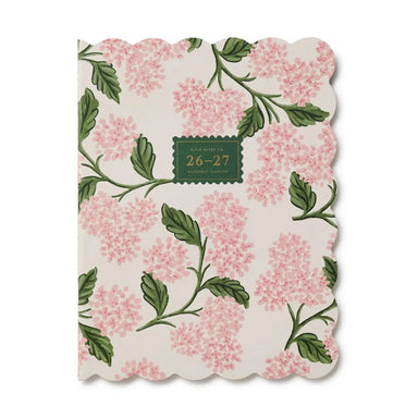 Organize your school year with ease using this Pink Hydrangea 12-Month Academic Calendar. Perfectly timed for August start dates, it features a full month-at-a-glance layout ideal for students, teachers, and parents. The thread-stitched binding and charming die-cut scalloped edges combine durability with style, while interior illustrations add visual appeal. Generous space throughout lets you track schedules, assignments, and important dates without feeling cramped. A practical companion for staying on top 