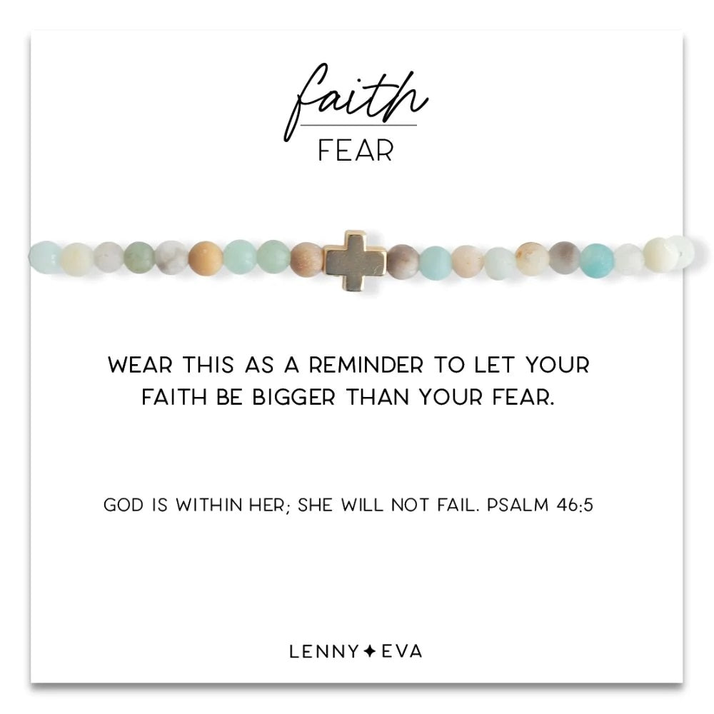 Fashion and faith meet in perfect harmony with Faith Over Fear Cross Bracelets. Featuring a classic elegance, these beautiful stretch bracelets make a powerful symbol of strength and resilience. The gold-plated cross charm accentuated with natural gemstone beads adds both style and meaning to your look.   Details:  6.5" stretches to fit most wrists (LE: 7") 4mm natural semi-precious gemstones (LE: 6mm) 12k gold plated brass beads and cross includes story card 