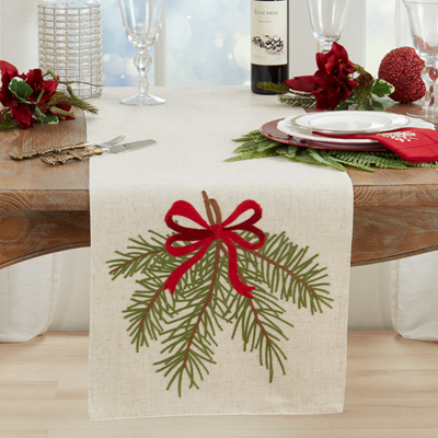 This beautiful table runner sets a lovely tone for your holiday table or buffet. There are so many creative ways to use it! It has a natural background, is 70 inches long, with the embroidered pine needle and bow covering 8 inches on each end.&nbsp;

Let us know if you have questions.&nbsp;

Dimensions: 16: x 70"

Material: 84% Polyester / 16% Linen

Care Instructions: Machine wash cold delicate cycle, do not bleach, hang dry