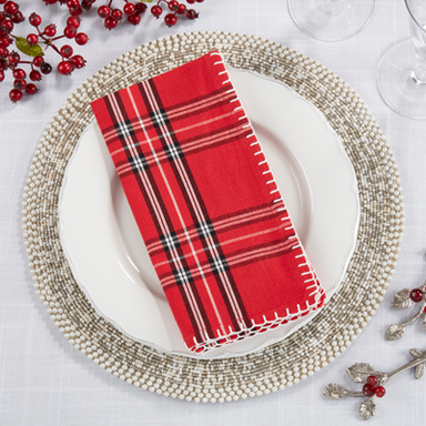 Create a beautiful tablescape with the addition of these elegant red plaid whipstitch dinner napkins. Perfect for Fall or Christmas, they'll add a pop of rich colorful red to your decor.&nbsp;

Set of 4.

Material: 100% cotton

Care Instructions: hand wash cold, lay flat to dry