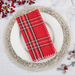 Create a beautiful tablescape with the addition of these elegant red plaid whipstitch dinner napkins. Perfect for Fall or Christmas, they'll add a pop of rich colorful red to your decor.&nbsp;

Set of 4.

Material: 100% cotton

Care Instructions: hand wash cold, lay flat to dry
