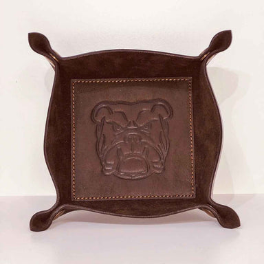 <p>We've got you covered for graduation and Father's Day with a gift he will really use! These leather valets neatly store, wallets, keys, change, or whatever clutters the top of his dresser and his pockets!&nbsp;</p> <p>Made of leather, these trays are embossed in the center with a variety of graphics like deer, a bulldog head, fish, and golf clubs.&nbsp;</p> <p>These can also be monogrammed on the top leather fold to be more personalized.&nbsp;</p>