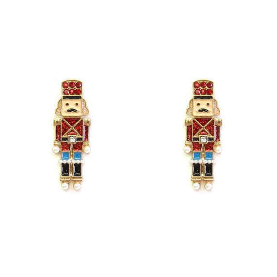 Add a festive touch to your holiday look with the Red Nutcracker Post Earrings. These playful Christmas earrings bring seasonal cheer to any outfit, making them perfect for parties or everyday wear during the holidays. Lightweight and comfortable, they’re designed to spread joy and sparkle wherever you go.

1.5"