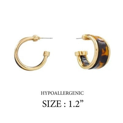 Capture the essence of fall with these Brown Tortoise Acrylic Hoop Earrings, accented by a sleek gold trim for a refined finish. Designed as lightweight post earrings, they offer both comfort and style, making them the perfect accessory to enhance your seasonal wardrobe with warm, beautiful colors.

Diameter: 1.2"