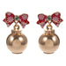 Add a festive touch to your holiday look with the Christmas Bow &amp; Ornament Post Earrings. These playful Christmas earrings bring seasonal cheer to any outfit, making them perfect for parties or everyday wear during the holidays. Lightweight and comfortable, they’re designed to spread joy and sparkle wherever you go.

1.25"