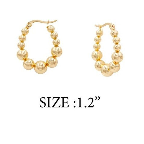Discover the charm of these gold stainless steel beaded hoop earrings, designed to add a lovely style to your look. Crafted with durability and shine. Perfect for everyday wear or special occasions.

Length 1.25"