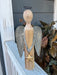 Add a touch of faith to your home with our Wood & Metal Angel. This meaningful gift is made of wood and metal, serving as a reminder of the power of faith. Perfect for tabletop décor, it brings a sense of peace and inspiration to any room.