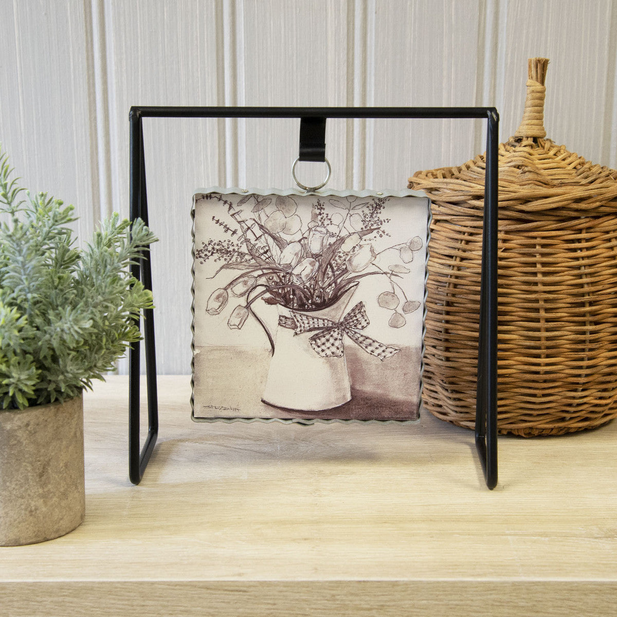 Display your prints and charms on our black Gallery Art Stand. This stand pairs wonderfully with our Gallery Wall Art and Charms.  Dimension 1: 9" x 3.5" x 9"