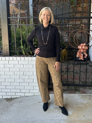 Striking leopard print meets timeless silhouette in these high-waist pants. The wide-leg cut flatters the figure while maintaining effortless style. Pair with a black top and boots for an instantly polished look, or dress them down with a casual tee. Versatile enough for any occasion.

Barbara is wearing a size Small.

Material: 100% Cotton; Lining: 100% Rayon

Care Instructions: Hand wash in cold, line dry
