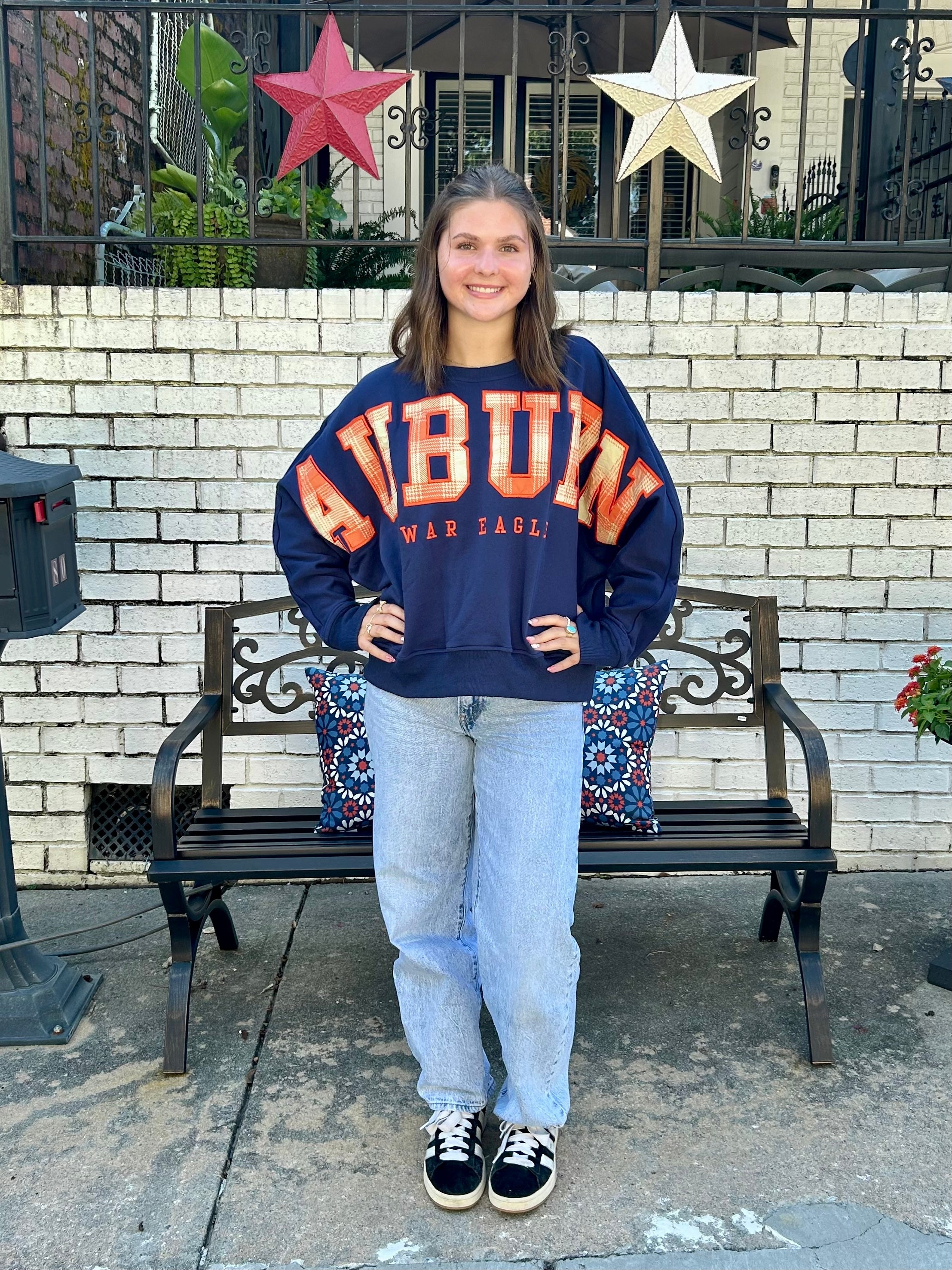 Nothing shows your love for your team like this amazing oversized dolman sleeve fleece crewneck with extra large plaid fabric appliqué outlined with embroidery! It is so cute, so cozy and so bold! It features a small team logo at the left sleeve cuff.

If we don't have your college, ask if we can get it!&nbsp;

Fabrication: 100% Cotton Fleece