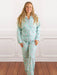 Slip into comfort with our Mahjong Stripe PJ Set, crafted from soft woven cotton for nights of blissful rest and mornings of effortless ease. This charming ensemble features a classic button-down long sleeve top paired with drawstring waist pants, both designed with an adjustable fit that moves with you. The whimsical mahjong-inspired toile print adds a playful touch to your sleepwear rotation. Whether you're unwinding after a long day or lounging on lazy weekends, this versatile set delivers the perfect bl