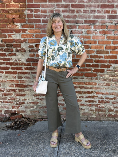 Effortless style meets everyday practicality in these wide-leg pants. Designed with front and back pockets, you'll have plenty of space for your essentials without sacrificing silhouette. The lightweight fabric keeps you comfortable all day long, while the rich olive hue adds a versatile pop of color to any wardrobe. Perfect for casual outings or relaxed workdays, these pants deliver the perfect balance of function and fashion.

Material: 60% Rayon /&nbsp; 35% Nylon / 5% Spandex

Care Instructions: Machine 