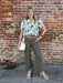 Effortless style meets everyday practicality in these wide-leg pants. Designed with front and back pockets, you'll have plenty of space for your essentials without sacrificing silhouette. The lightweight fabric keeps you comfortable all day long, while the rich olive hue adds a versatile pop of color to any wardrobe. Perfect for casual outings or relaxed workdays, these pants deliver the perfect balance of function and fashion.

Material: 60% Rayon /&nbsp; 35% Nylon / 5% Spandex

Care Instructions: Machine 