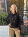 You will love this sleek black turtleneck with unique seam detailing at the neckline and wrists. Lightweight fabric makes it perfect for layering or wearing solo. Versatile enough to dress up or down—pairs effortlessly with jeans, skirts, trousers, or under blazers. A wardrobe essential that works for casual days and polished occasions alike.

Barbara is wearing a size Small.

Material: 66% Polyester / 29% Rayon / 5% Spandex

Care Instructions: Gentle wash cold, hang to dry