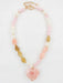 Make a heartfelt statement with this enchanting beaded necklace, showcasing a gorgeous pink heart pendant surrounded by a harmonious palette of pink, cream, and gray beads. This versatile piece is your go-to accessory for Valentine's Day romance, spring refreshes, or timeless everyday elegance.&nbsp;

Length: 16-18"