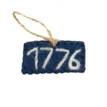 Celebrate Independence Day in style with these charming felt ornaments that bring festive patriotic spirit to any space. Crafted from soft, durable felt in classic red, white, and blue, each ornament features designs perfect for holiday decorating. Mix and match these delightful pieces to create a coordinated look—they pair beautifully with our Jute Tree for an authentic, rustic aesthetic. Whether you're trimming your tree, adorning a wreath, or displaying them year-round, these ornaments add a fun, patriot