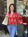 This long sleeve floral V-neck top by THML features detailed neck stitching and a vibrant red background adorned with an elegant floral design. The pleated front adds a sophisticated touch, creating a stunning combination of textures and patterns.

Tara is wearing a medium and paired it with Risen jeans and our Preenlove bag.

Material: 100% Cotton

Care Instructions: Gentle cool hand wash, dry flat