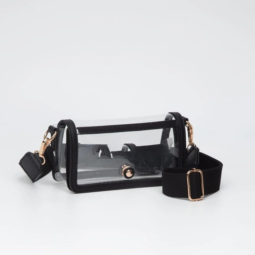 You'll be stylish and ready for Game Day! The Lindsay Clear Gameday Crossbody Bag meets stadium, concert, and venue clear bag policies while keeping your essentials visible and secure. This compact crossbody features an adjustable, detachable shoulder strap for comfortable hands-free carry and a magnetic flap closure that's both secure and easy to access. Perfect for events where clarity counts—stay compliant without sacrificing style.

Details:


Size: 8" x 2" x 4"
Magnetic Flap Closure

Adjustable &amp; D