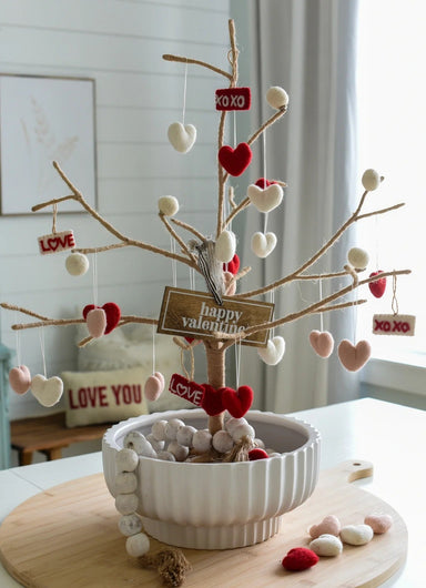 Decorative Valentine's Day jute tree with heart-shaped felt ornaments.