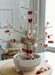 Decorative Valentine's Day jute tree with heart-shaped felt ornaments.