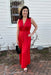 You will definitely make a statement in the lovely red maxi dress! It is sleeveless with a low V-neck. The length is maxi and the material has a stain fee. The waist is shirred with elastic.  Material: 100% Polyester  Care Instructions: Hand wash cold separately, hand dry