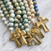 Blessing beads are a unique way to remind you of God’s love and make a thoughtful all-occasion gift! Hung from doorknobs or drawer pulls, draped from a bowl, basket or picture frame, or simply placed on a coffee or side table, blessing beads add a special decorative touch to any space in your home.