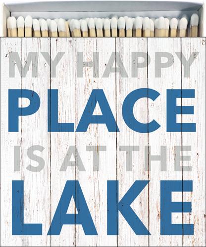 Large square box measures 4.25" square and has 60 matches in a reusable box. Blue and gray print says My Happy Place is at the Lake.