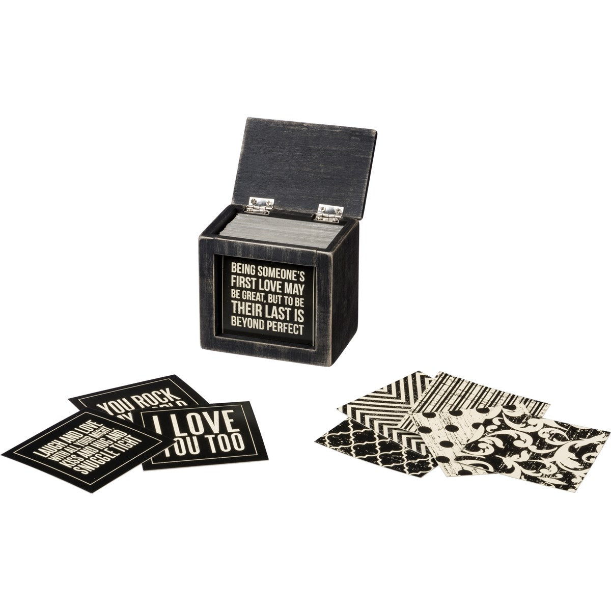 A black and white wooden hinged box with 80 double-sided love themed inspirational sayings.