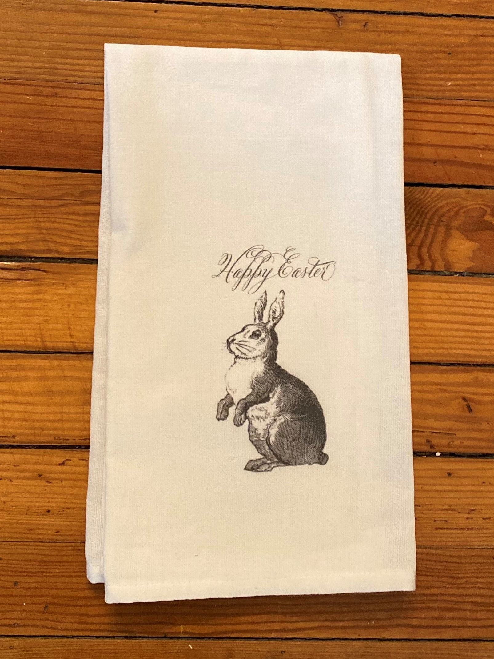 What a sweet, precious tea towel for Easter! It features a gray bunny with "Happy Easter" lettering. What a precious keepsake for the season!  Details:   ​100% Cotton Dimensions 20x25 inch