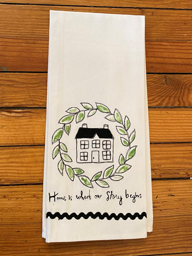 What a precious tea towel for newlyweds or new home owners! The tea towel's inscription is "Home is Where our Story begins". It's a house surrounded by leaves and a rick rack border.   Material: 100% Polyester  Care Instructions: Spot clean only