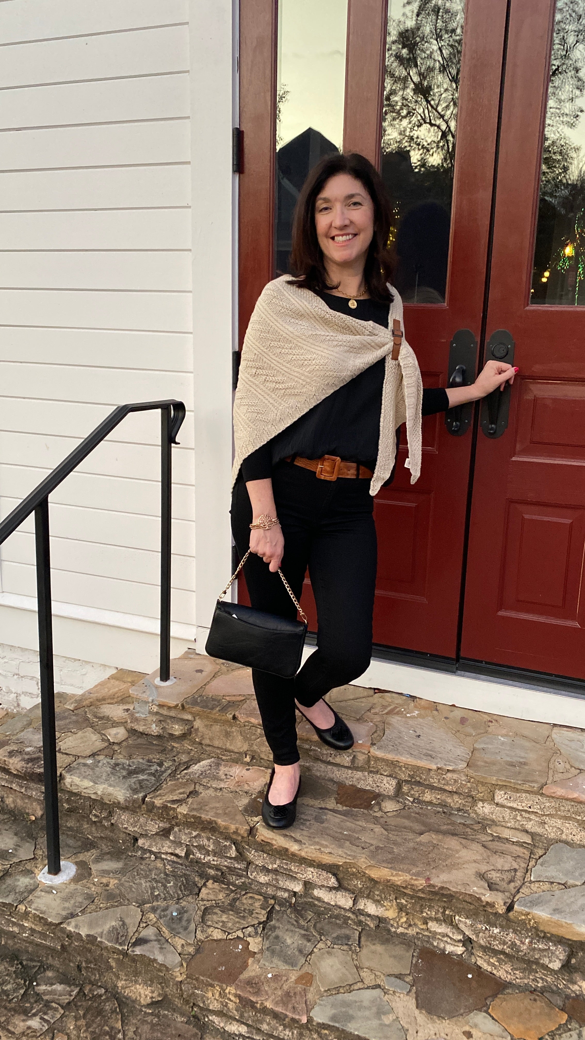 For a light but extra layer of warmth, you will love this cable knit shawl - it's so soft can cozy! It's a larger cable knit and comes with a strap adornment on the left, front of the shawl. It's comes in several colors to suit your style!  Material: 100% Acrylic  Care Instructions: Hand wash cold